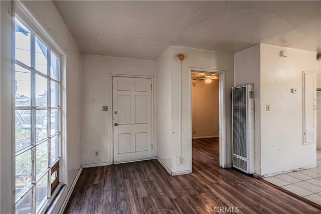 foyer entrance with dark hardwood / wood-style flooring