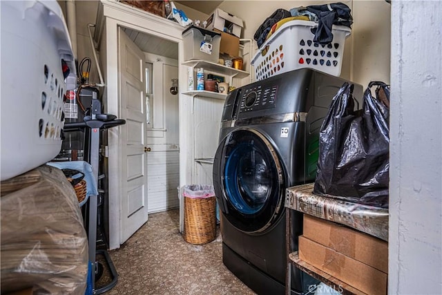 washroom featuring washer / clothes dryer