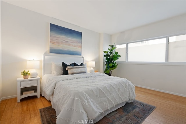 bedroom featuring hardwood / wood-style floors