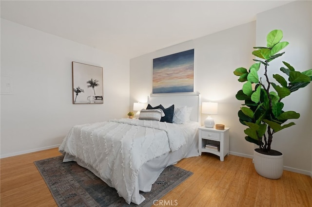 bedroom featuring hardwood / wood-style flooring