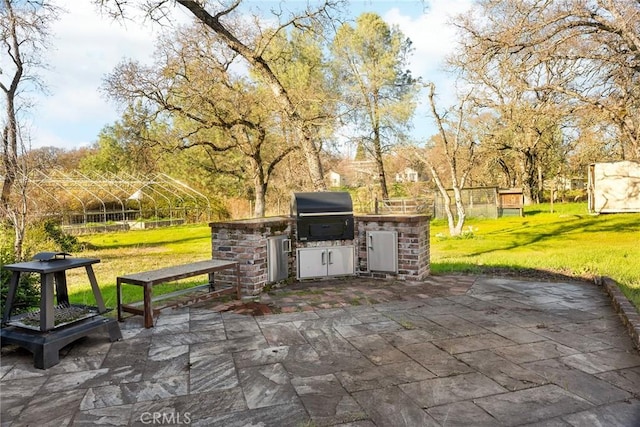 view of patio with area for grilling