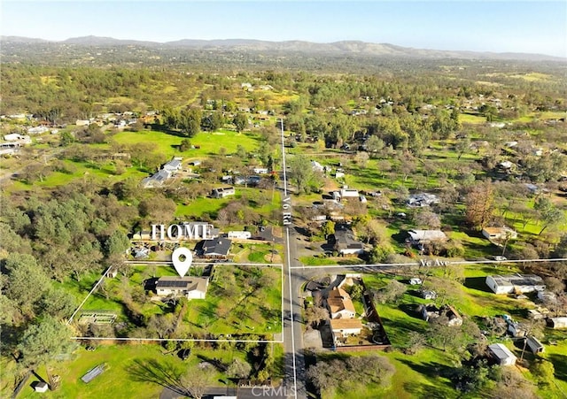 bird's eye view with a mountain view