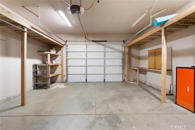 garage featuring a garage door opener