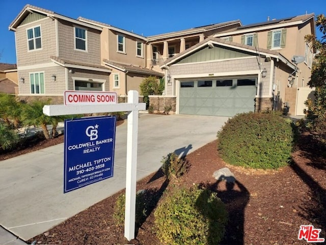 view of front of property with a garage