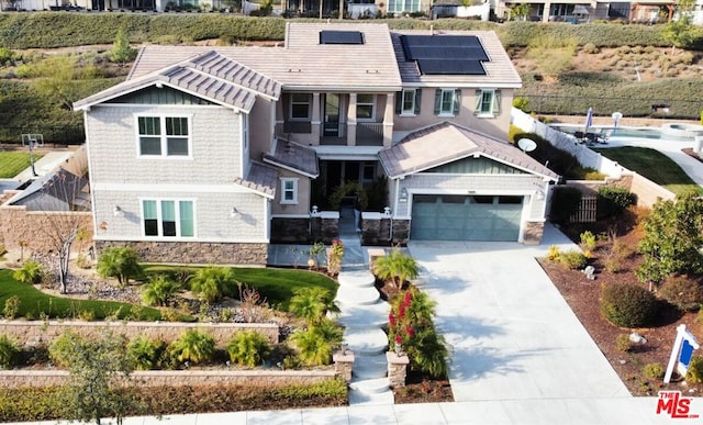 view of front of house with solar panels