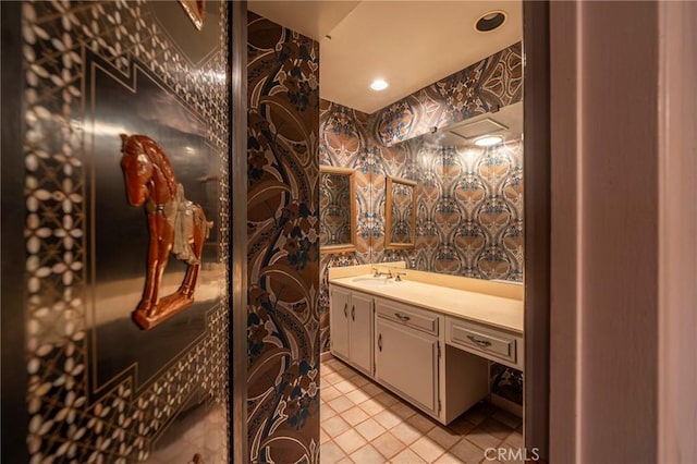 bathroom with vanity and tile patterned floors