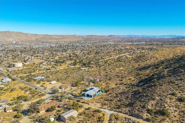 bird's eye view with a mountain view