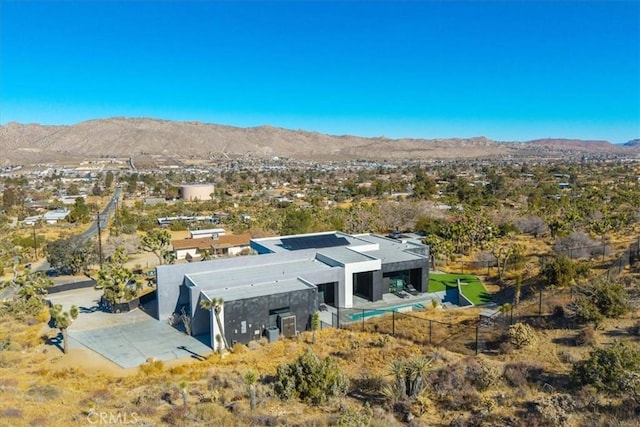 drone / aerial view featuring a mountain view