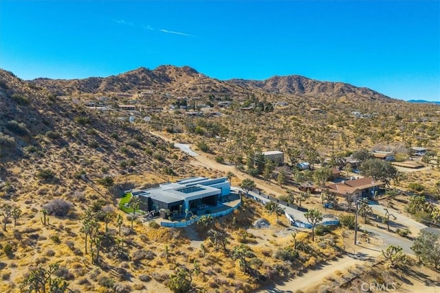 drone / aerial view featuring a mountain view