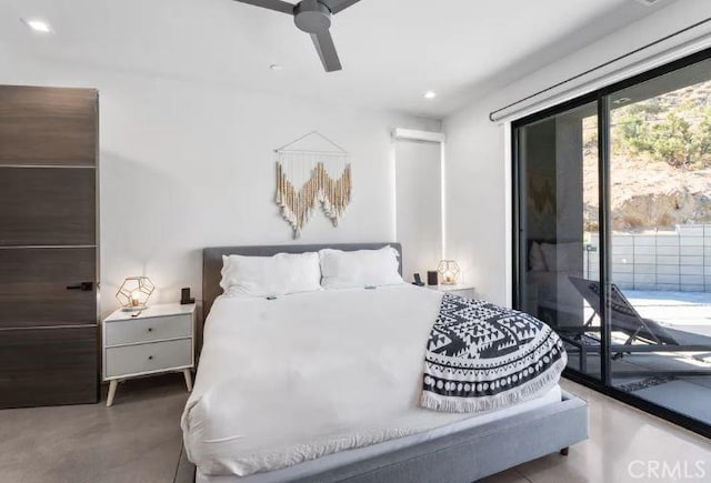 bedroom with ceiling fan, concrete flooring, and access to outside