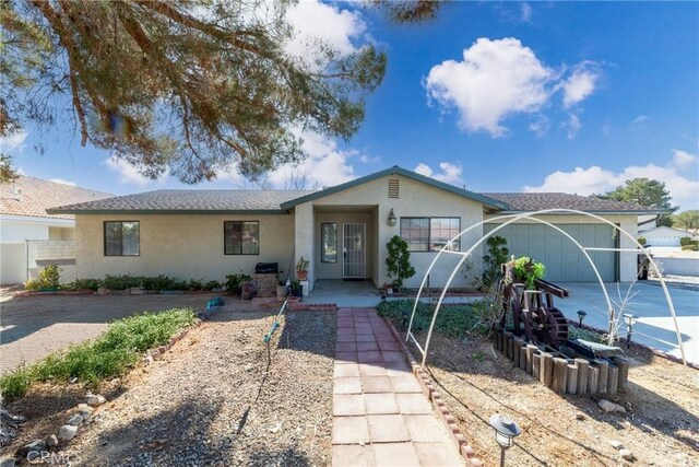 ranch-style home with a garage