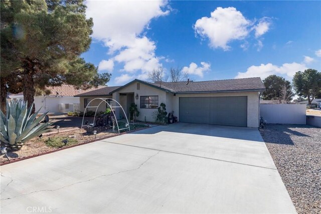 single story home with a garage