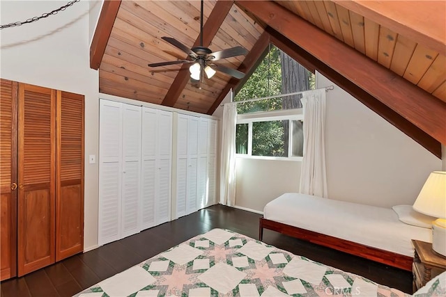 unfurnished bedroom with ceiling fan, wooden ceiling, dark hardwood / wood-style flooring, and vaulted ceiling with beams