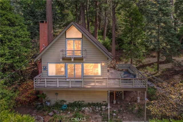 view of property exterior with a balcony