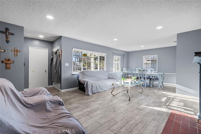 bedroom with a textured ceiling and a closet