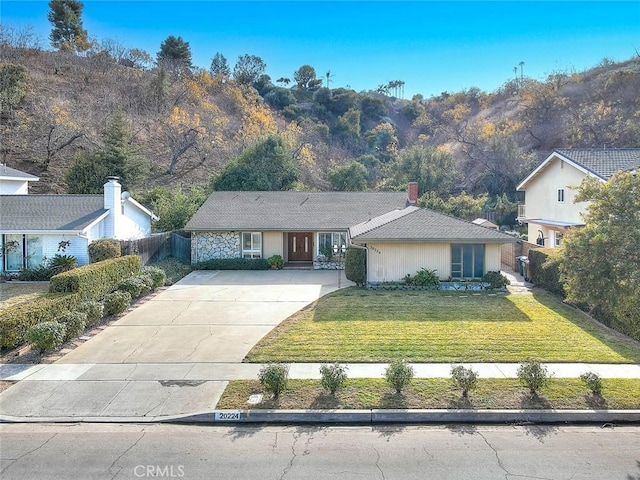 view of front of property with a front lawn