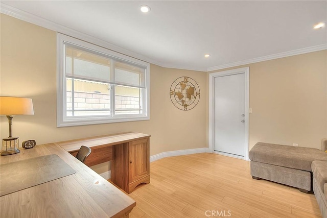 office area featuring crown molding and light hardwood / wood-style floors