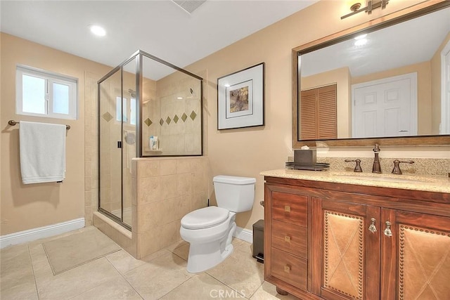 bathroom featuring walk in shower, vanity, toilet, and tile patterned flooring