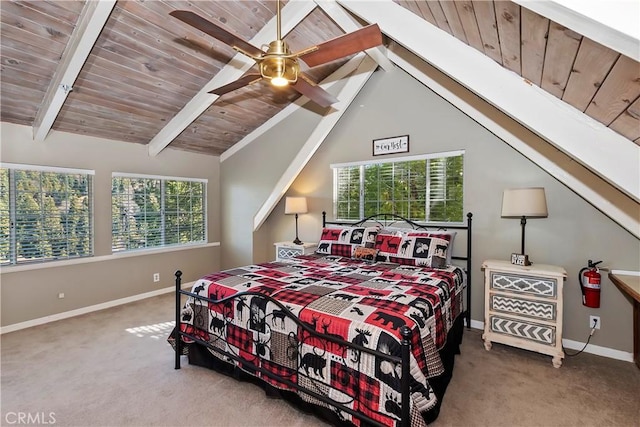 carpeted bedroom with multiple windows, vaulted ceiling with beams, and ceiling fan