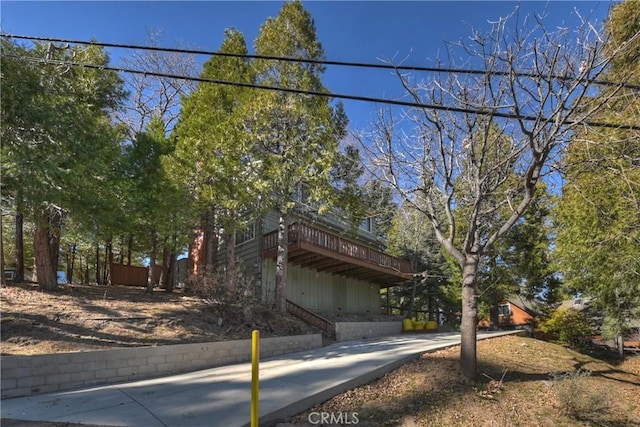 view of front of house with a deck