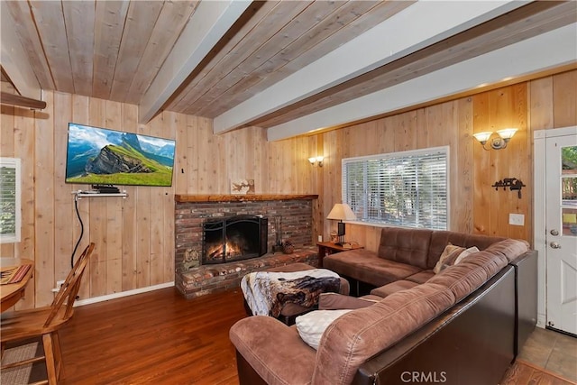28621 Shenandoah Dr, Lake Arrowhead, CA 92352 - living room featuring wooden walls, plenty of natural light, wood finished floors, a fireplace, and a wood ceiling with exposed beams