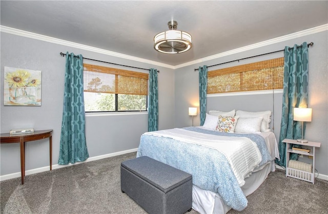 bedroom with crown molding and dark colored carpet