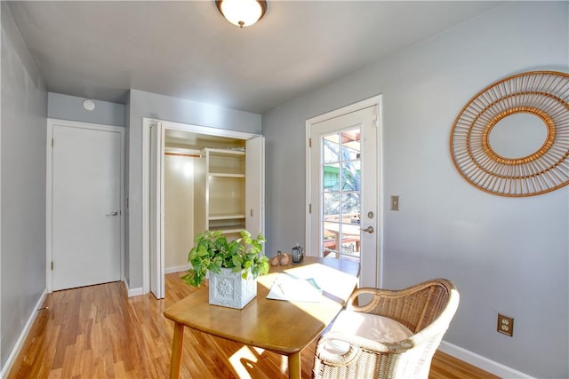 office space with light hardwood / wood-style flooring