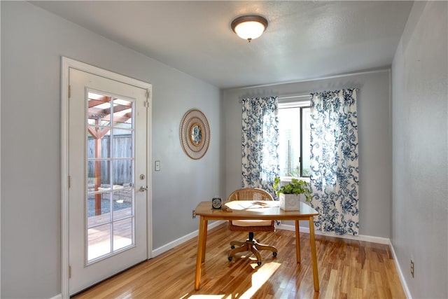 home office featuring light wood-type flooring