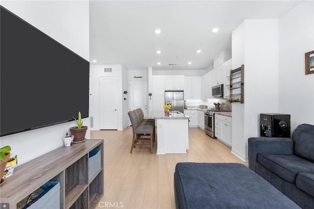 living room featuring light hardwood / wood-style floors