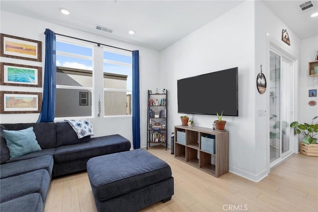 living room featuring light wood-type flooring