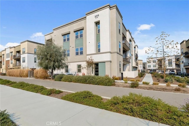 view of building exterior featuring a residential view