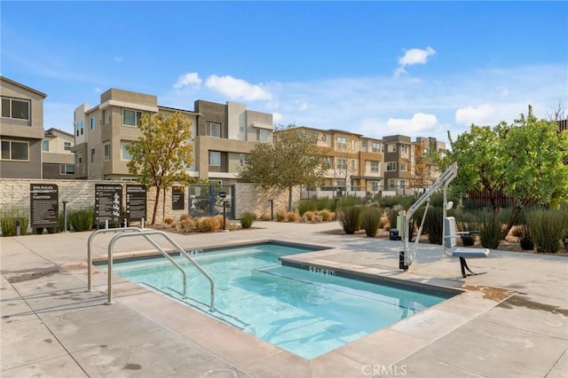 view of pool featuring a patio area