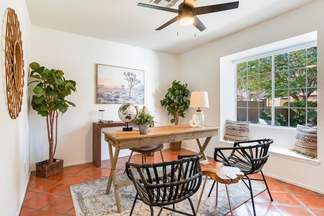 office featuring tile patterned floors and ceiling fan