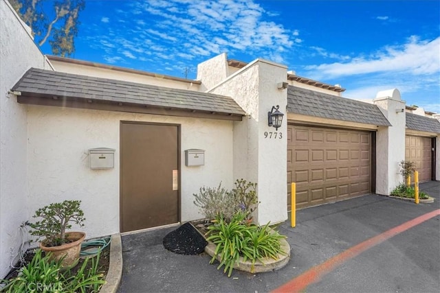 entrance to property with a garage