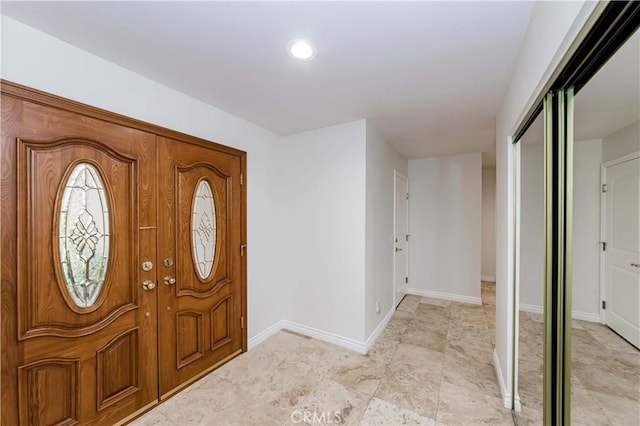 entrance foyer with baseboards