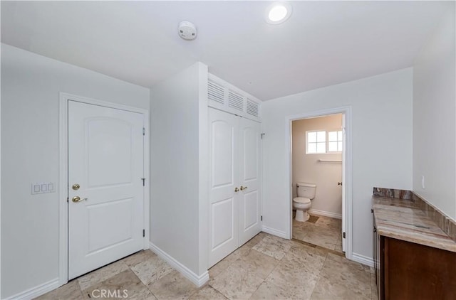 bathroom featuring toilet