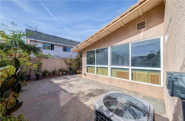 view of patio with central AC unit