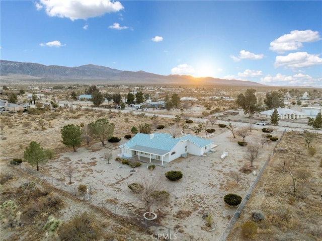 drone / aerial view featuring a mountain view