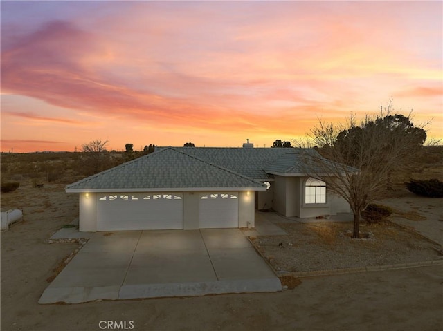 view of front of property featuring a garage