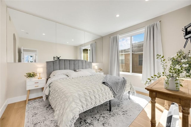 bedroom featuring light hardwood / wood-style floors