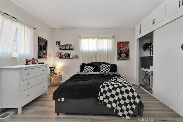 bedroom featuring light hardwood / wood-style flooring