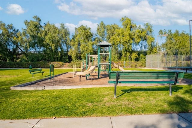 view of jungle gym with a yard