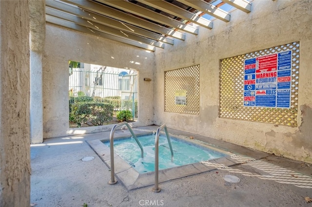 view of pool featuring a community hot tub