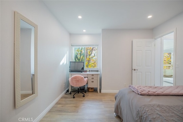 bedroom with light hardwood / wood-style floors