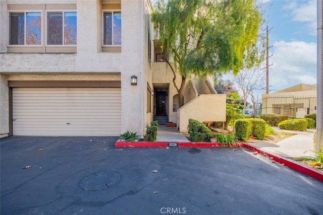 view of property featuring a garage