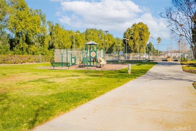 view of play area with a yard