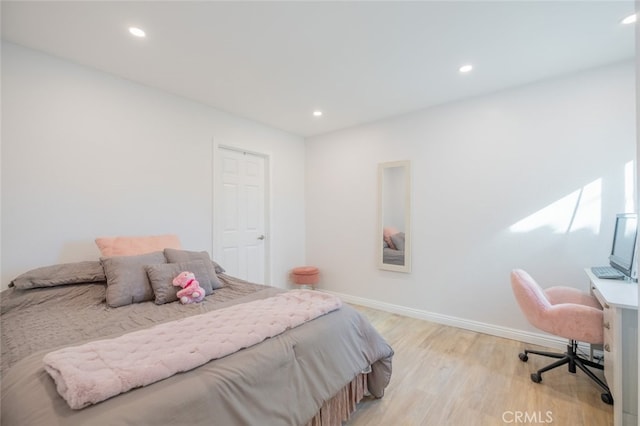 bedroom featuring light hardwood / wood-style floors