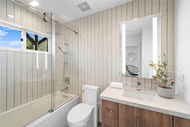2335 Hillview Dr, Laguna Beach, CA 92651 - full bath featuring tile walls, enclosed tub / shower combo, vanity, and tasteful backsplash