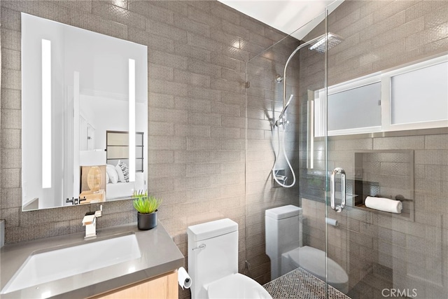 2335 Hillview Dr, Laguna Beach, CA 92651 - bathroom featuring a shower stall, vanity, and tile walls