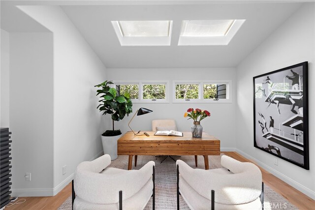 2335 Hillview Dr, Laguna Beach, CA 92651 - home office featuring a skylight, light wood finished floors, and vaulted ceiling